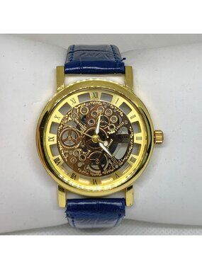 Skeleton dial style gold tone watch 39mm round quartz blue leather band running